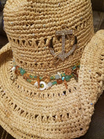Scala 100% Raffia hat done in Swarovski crystals.